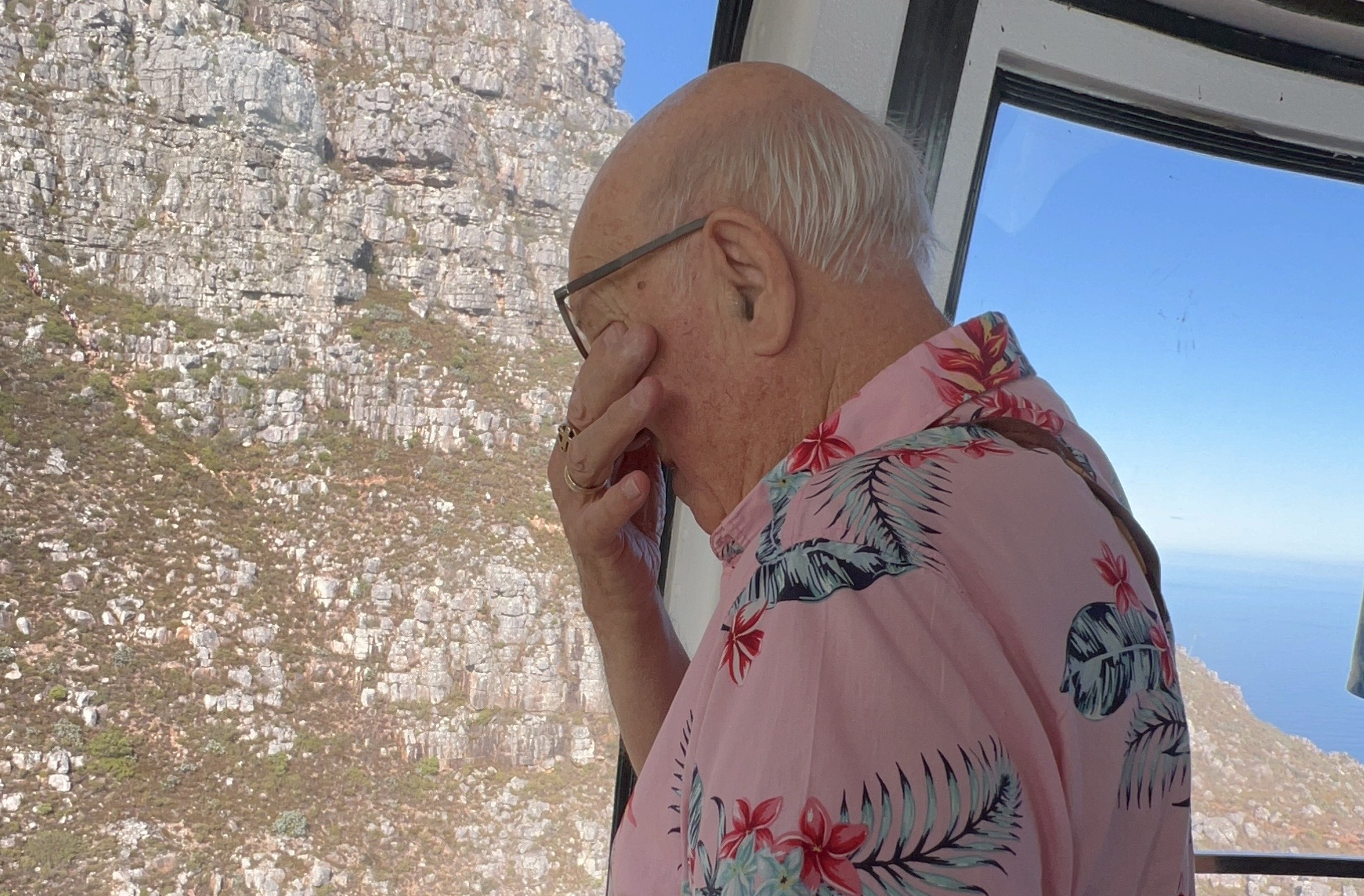 A South African who lived on table mountain for the first 11 months of his life has returned to the peak - for the first time - to celebrate his 79th birthday.